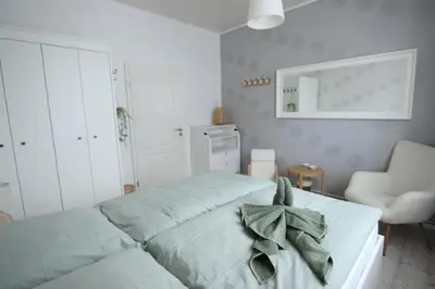 Ein Bett oder Betten in einem Zimmer der Unterkunft Ferienwohnung Erni-Harz