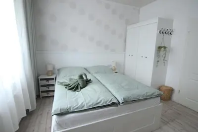 Ein Bett oder Betten in einem Zimmer der Unterkunft Ferienwohnung Erni-Harz