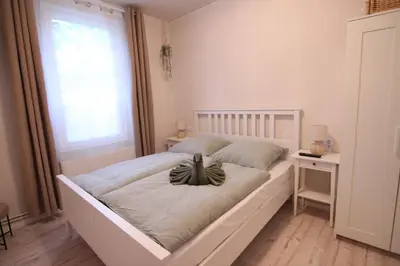 Ein Bett oder Betten in einem Zimmer der Unterkunft Ferienwohnung Erni-Harz
