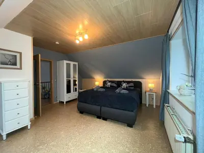 Ein Bett oder Betten in einem Zimmer der Unterkunft Ferienhaus Auszeit Harz Braunlage/Hohegeiß