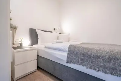 Ein Bett oder Betten in einem Zimmer der Unterkunft Ferienwohnung Hirschkuss