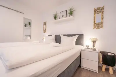 Ein Bett oder Betten in einem Zimmer der Unterkunft Ferienwohnung Hirschkuss