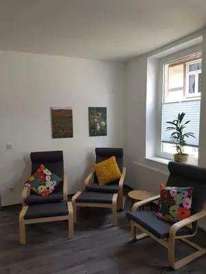 Ein Sitzbereich in der Unterkunft Gästehaus Harzstraße