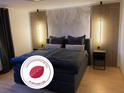 Ein Bett oder Betten in einem Zimmer der Unterkunft Fewo Gipfelglück