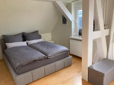 Ein Bett oder Betten in einem Zimmer der Unterkunft Fewo Gipfelglück