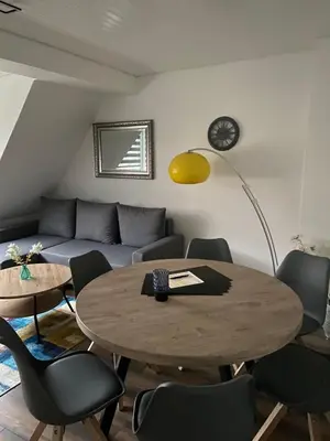 Ein Sitzbereich in der Unterkunft Blue Wave
