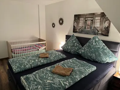 Ein Bett oder Betten in einem Zimmer der Unterkunft Blue Wave