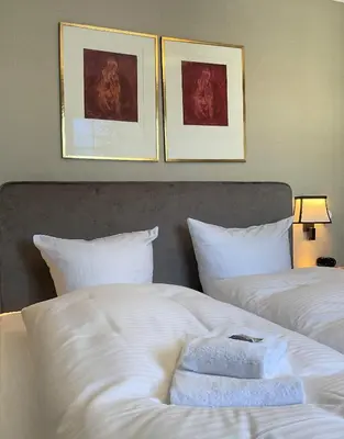 Ein Bett oder Betten in einem Zimmer der Unterkunft Luxus Ferienwohnung Kaminzeit