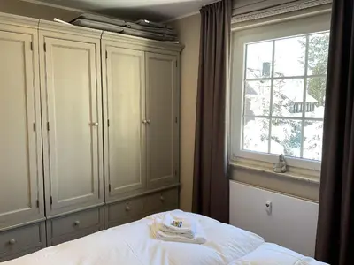 Ein Bett oder Betten in einem Zimmer der Unterkunft Luxus Ferienwohnung Kaminzeit