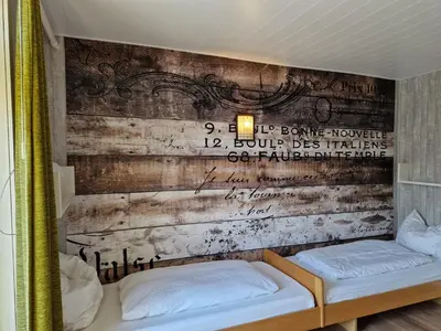 Ein Bett oder Betten in einem Zimmer der Unterkunft Harz Hotel Waldhaus