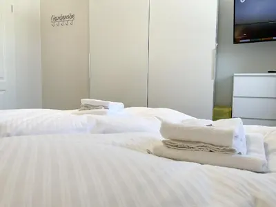 Ein Bett oder Betten in einem Zimmer der Unterkunft Luxus Ferienwohnung Bergblick