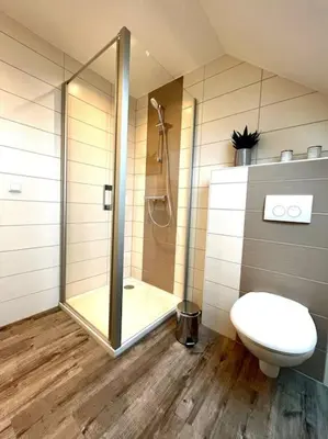Ein Badezimmer in der Unterkunft Ferienhaus Leni Bettwäsche Handtücher inkl