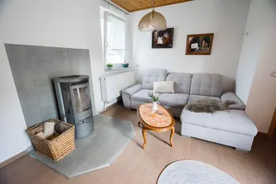 Ein Sitzbereich in der Unterkunft Ferienhaus Geiserich