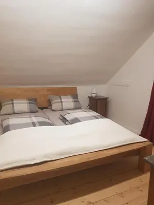 Ein Bett oder Betten in einem Zimmer der Unterkunft Ferienwohnung Peters