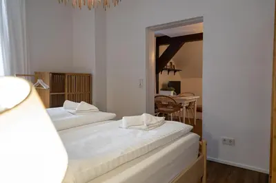 Ein Bett oder Betten in einem Zimmer der Unterkunft Bäckerei Koch Fewo 3
