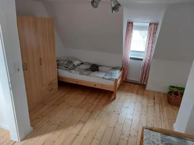 Ein Bett oder Betten in einem Zimmer der Unterkunft Einfamilienhaus Blick zum Rammelsberg