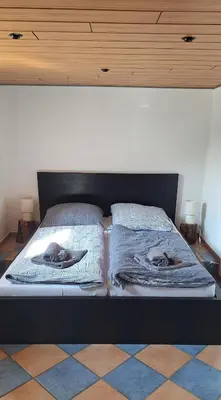 Ein Bett oder Betten in einem Zimmer der Unterkunft Einfamilienhaus Blick zum Rammelsberg