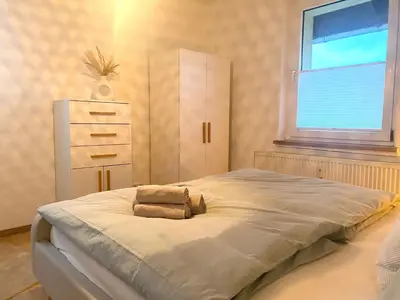 Ein Bett oder Betten in einem Zimmer der Unterkunft Ferienwohnung Hexenlandeplatz