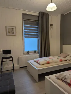 Ein Bett oder Betten in einem Zimmer der Unterkunft Ferienwohnung Quedlinburg