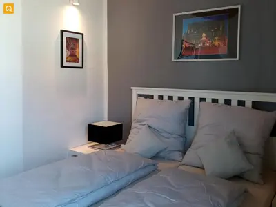 Ein Bett oder Betten in einem Zimmer der Unterkunft Ferienwohnung Quedlinburg