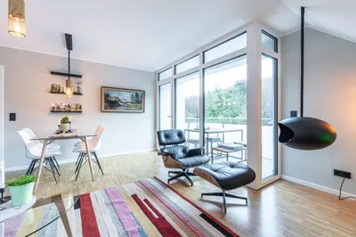 Ein Sitzbereich in der Unterkunft Waldbewohner Apartments / Hirsch