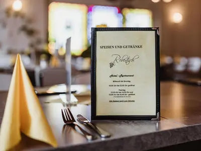 Ein Zertifikat, Auszeichnung, Logo oder anderes Dokument, das in der Unterkunft REBENTISCH - HOTEL Ferienwohnungen Restaurant ausgestellt ist