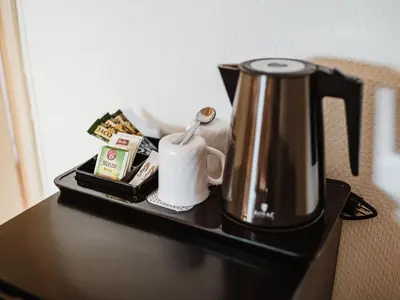 Kaffee-/Teezubehör in der Unterkunft REBENTISCH - HOTEL Ferienwohnungen Restaurant