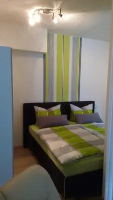 Ein Bett oder Betten in einem Zimmer der Unterkunft Apartment Halmis FeWo WR