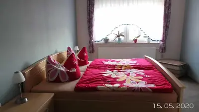 Ein Bett oder Betten in einem Zimmer der Unterkunft Ferienwohnung Reulecke