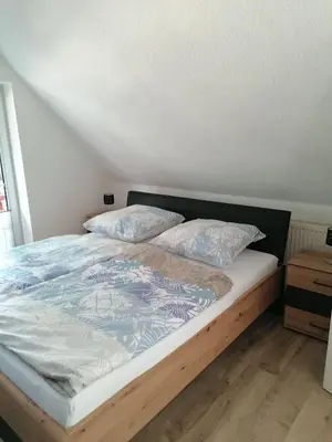 Ein Bett oder Betten in einem Zimmer der Unterkunft Ferienwohnung Friedrich