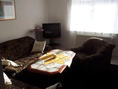 Ein Sitzbereich in der Unterkunft Harzpension Haus Königskopf