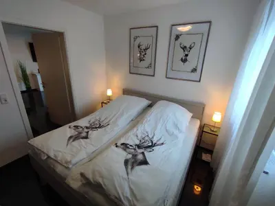 Ein Bett oder Betten in einem Zimmer der Unterkunft Ferienwohnung Schätzchen am Wald