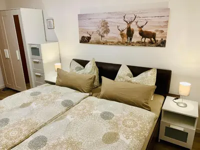 Ein Bett oder Betten in einem Zimmer der Unterkunft Haus Heidi Harz