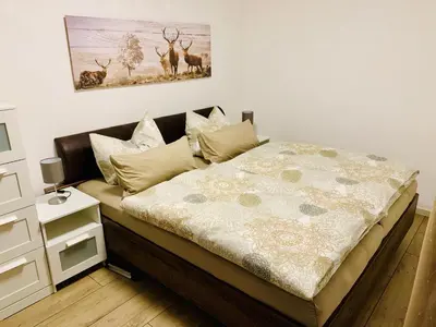 Ein Bett oder Betten in einem Zimmer der Unterkunft Haus Heidi Harz