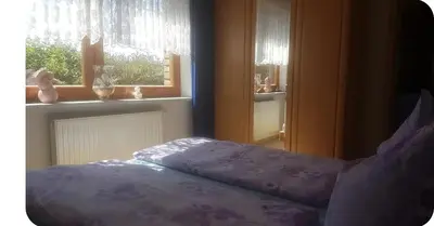 Ein Bett oder Betten in einem Zimmer der Unterkunft Haus Bergwiese