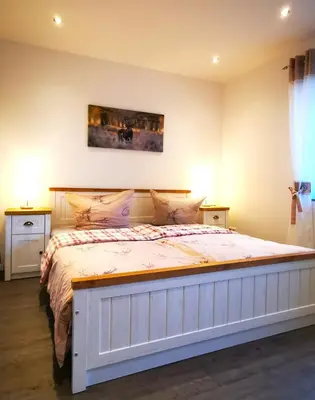 Ein Bett oder Betten in einem Zimmer der Unterkunft Ferienwohnung mit Schlossblick