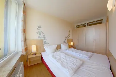 Ein Bett oder Betten in einem Zimmer der Unterkunft Apartment 518