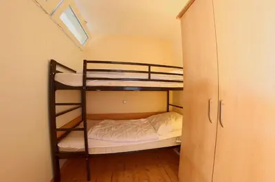 Ein Bett oder Betten in einem Zimmer der Unterkunft Apartment 518