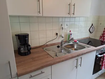 Küche/Küchenzeile in der Unterkunft FeWo Berg-Domizil Bad Harzburg mit eigenem Fahrradkeller und Parkplatz, inklusive Bettwäsche und Handtüchern