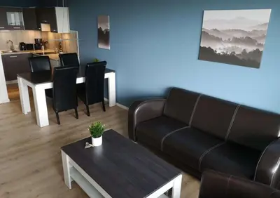 Ein Sitzbereich in der Unterkunft Apartment Harzblick - Traumaussicht & Schwimmbad