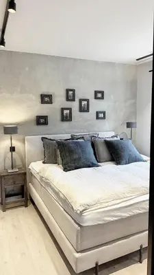 Ein Bett oder Betten in einem Zimmer der Unterkunft HOME Suites Loft mit Sauna