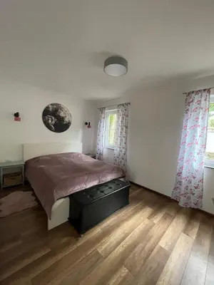 Ein Bett oder Betten in einem Zimmer der Unterkunft Falkennest