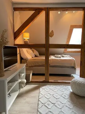 Ein Bett oder Betten in einem Zimmer der Unterkunft Bergrauschen - Baumkrone - Preise inklusive Wäsche