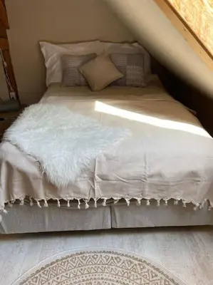 Ein Bett oder Betten in einem Zimmer der Unterkunft Bergrauschen - Baumkrone - Preise inklusive Wäsche