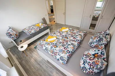 Ein Bett oder Betten in einem Zimmer der Unterkunft Appartement am Westerntor I