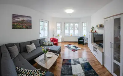 Ein Sitzbereich in der Unterkunft Appartement am Westerntor I