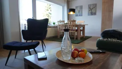 Ein Sitzbereich in der Unterkunft Ferienwohnung Hygge
