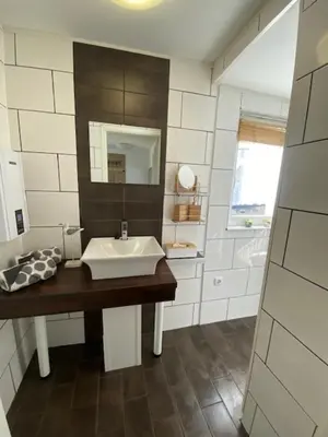 Ein Badezimmer in der Unterkunft Ferienhaus 
