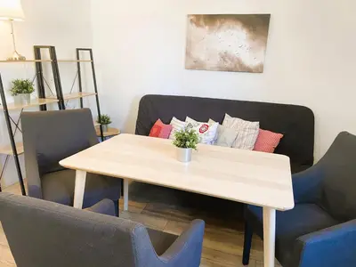 Ein Sitzbereich in der Unterkunft Peters Aparthotel