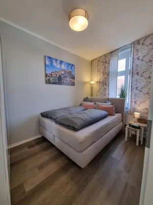 Ein Bett oder Betten in einem Zimmer der Unterkunft Fewo Mathilde